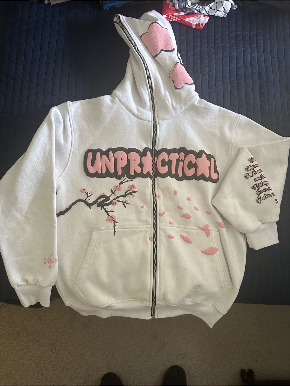 NWOT Unpractical White Zip-Up Hoodie with Pink Cherry Blossom Graphics